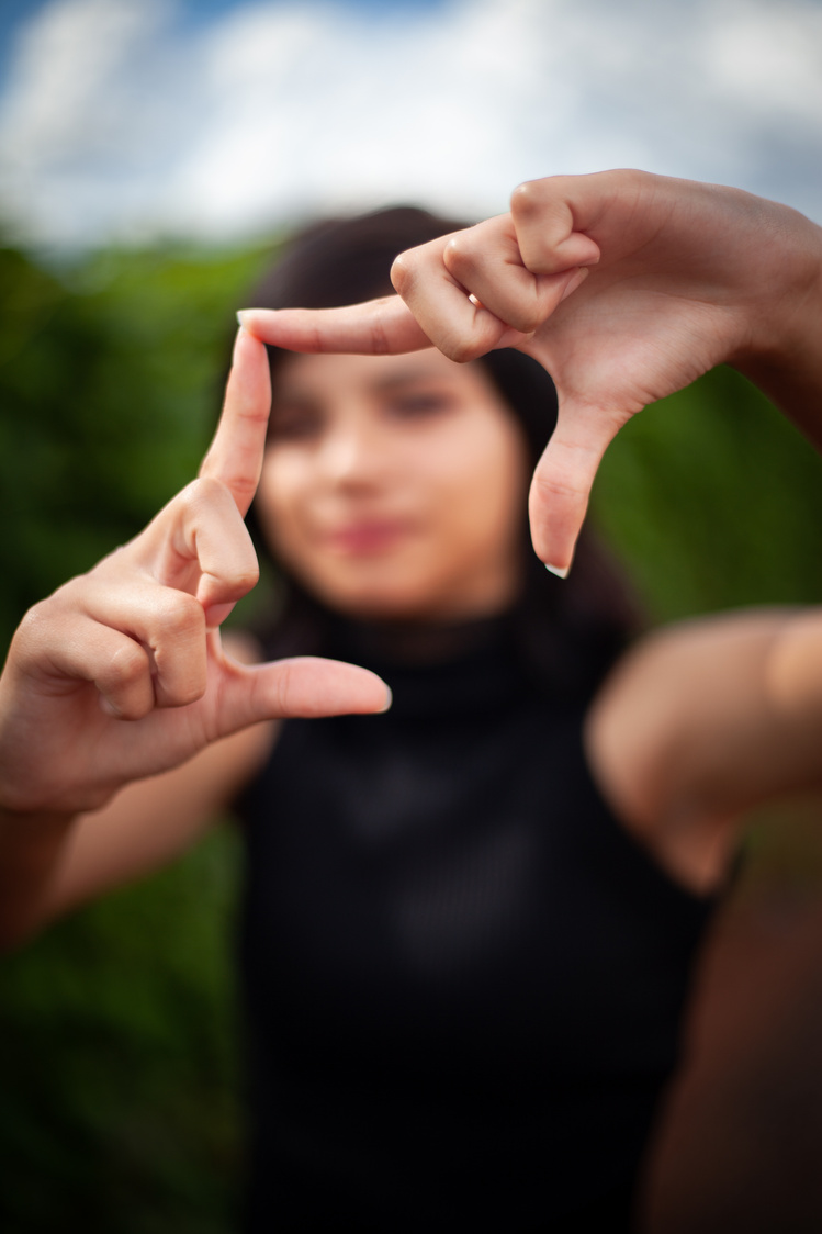 Photo of Woman Doing Hand Sign